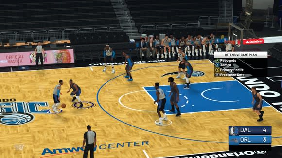 A screenshot of game play from NBA 2K19, showing virtual players on a basketball court.