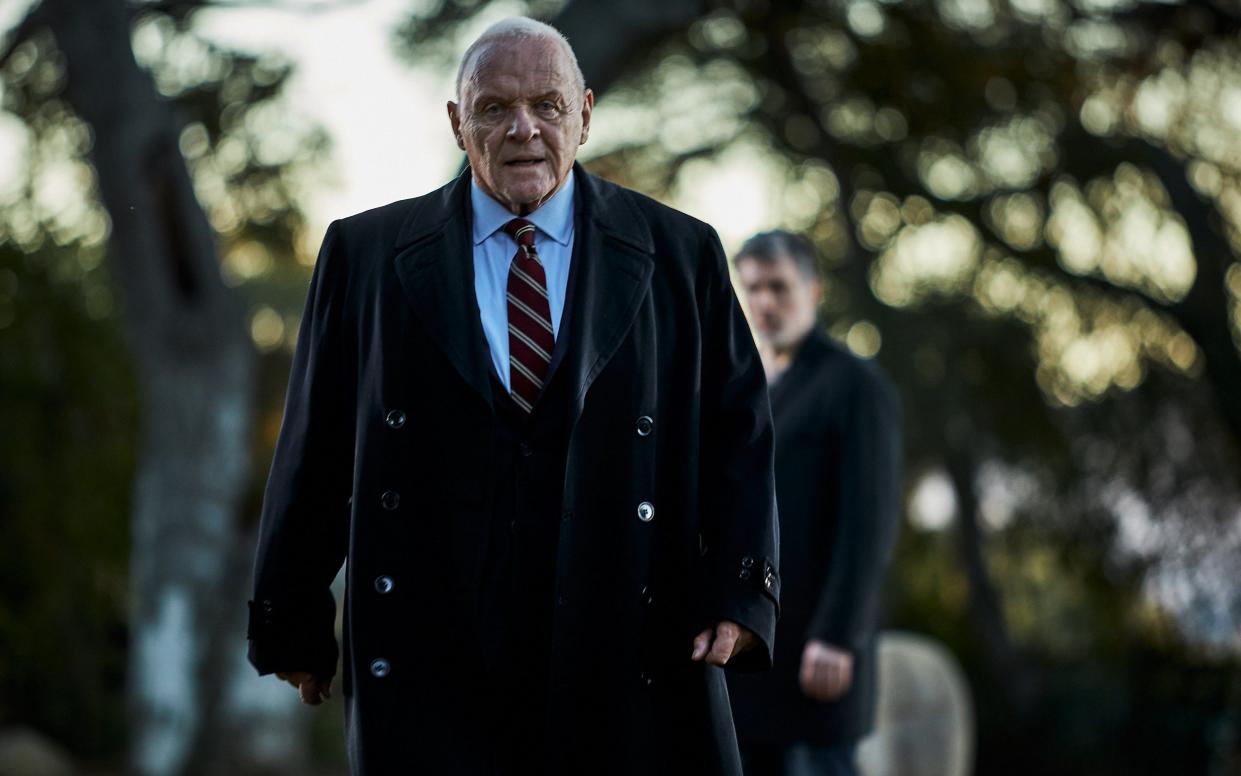 The Mentor (Anthony Hopkins) delivers advice in a graveyard, both literal and figurative - Lionsgate