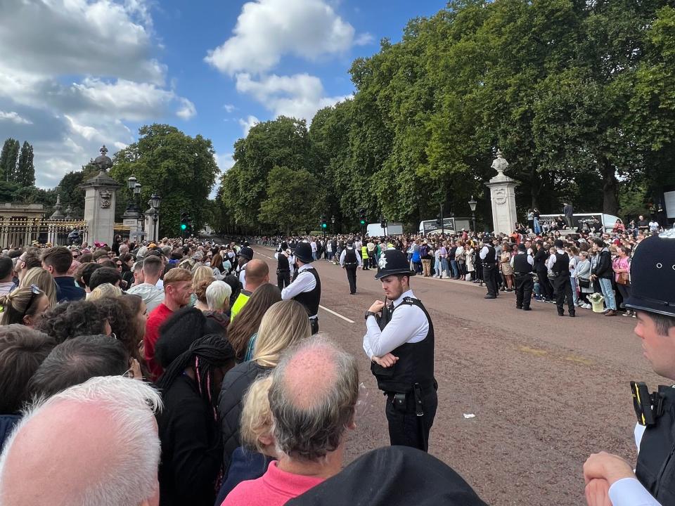 Police attempted to push the crowds back as Charles and Camilla's motorcade arrived.