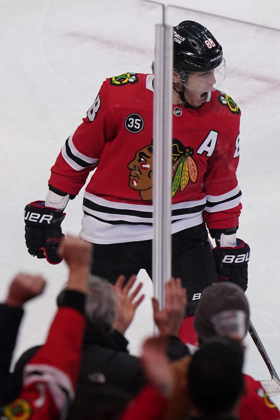 Chicago Blackhawks right wing Patrick Kane reacts after scoring a goal during the third period of an NHL hockey game against the Colorado Avalanche in Chicago, Friday, Jan. 28, 2022. The Avalanche won 6-4. (AP Photo/Nam Y. Huh)