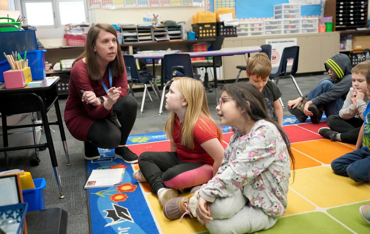 First-grade teacher Molly Lochemes teaches a reading lesson at General Mitchell Elementary School in Cudahy.