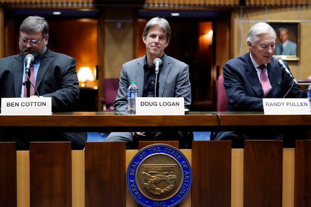 Then-Cyber Ninjas CEO Doug Logan, center, is flanked by Ben Cotton, left, founder of digital security firm CyFIR, and Randy Pullen, right, the former chairman of the Arizona Republican Party, prior to Arizona Senate Republicans hearing a review of the 2020 presidential election results in Maricopa County on Sept. 24, 2021, in Phoenix.  (Photo: AP Photo/Ross D. Franklin)