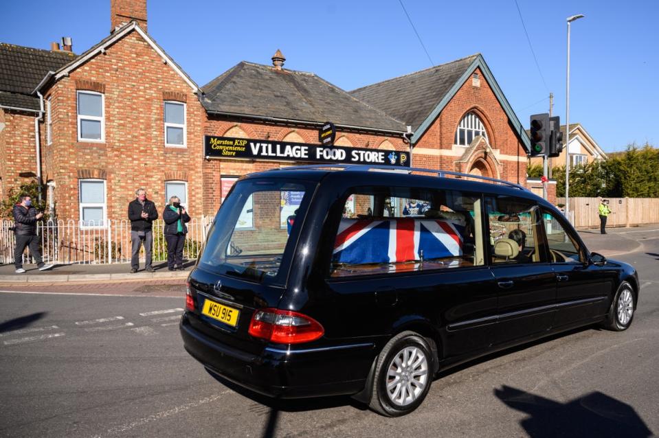 The coffin of Captain Tom was  driven through Marston Moretaine on the way to his resting place (Getty)