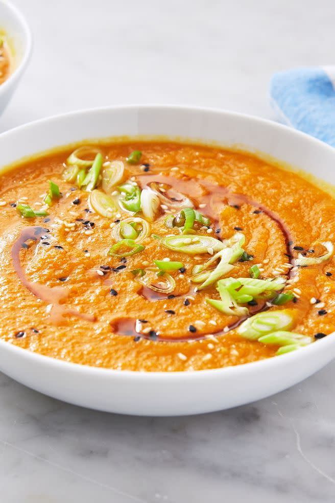 <p>This carrot soup is anything but boring. With ginger and allspice for flavour, miso for some funk and saltiness, and lime juice to brighten it up, this soup hits all the marks. </p><p>Get the <a href="https://www.delish.com/uk/cooking/recipes/a35210427/carrot-soup-recipe/" rel="nofollow noopener" target="_blank" data-ylk="slk:Ginger Miso Carrot Soup;elm:context_link;itc:0" class="link ">Ginger Miso Carrot Soup</a> recipe.</p>