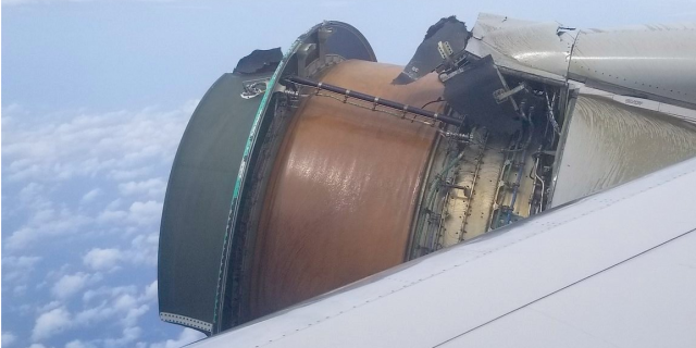 Terrifying video shows jet engine falling apart mid flight on its