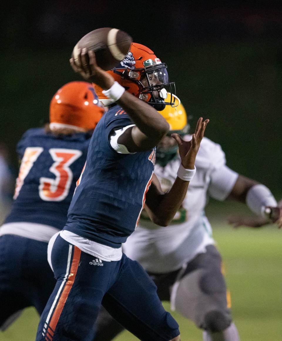 Quarterback Anthony Hall (6) passes during the Pensacola Catholic vs Escambia football game at Escambia High School in Pensacola on Friday, Sept. 1, 2023.