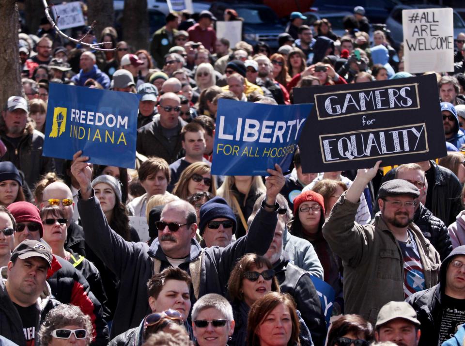 Demonstrators gather to protest a controversial religious freedom bill in Indianapolis