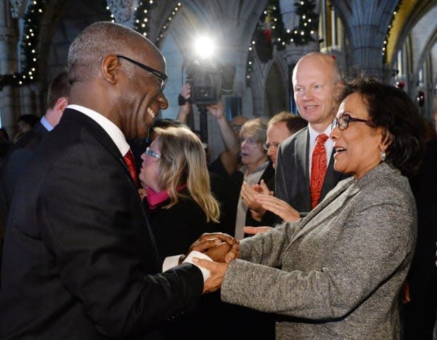 Quebec Liberal MP Emmanuel Dubourg, left, shakes hands with B.C. Liberal MP Hedy on Parliament Hill in Ottawa. A newly formed non-profit called Black Voters Matter Canada is trying to get more Black politicians to run for office, especially with the possibility of a federal election in the near future. (THE CANADIAN PRESS/Sean Kilpatrick - image credit)