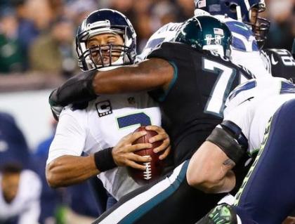 Russell Wilson took some hits, but kept the Seahawks in playoff contention. (Reuters) 