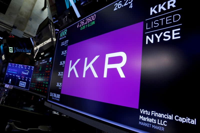 FILE PHOTO: Trading information for KKR & Co is displayed on a screen on the floor of the NYSE in New York