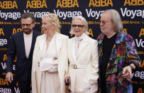 Members of ABBA, from left, Bjorn Ulvaeus, Agnetha Faltskog, Anni-Frid Lyngstad and Benny Andersson arrive for the ABBA Voyage concert at the ABBA Arena in London, Thursday May 26, 2022. ABBA is releasing its first new music in four decades, along with a concert performance that will see the "Dancing Queen" quartet going entirely digital. The virtual version of the band will begin a series of concerts on Thursday. (AP Photo/Alberto Pezzali)