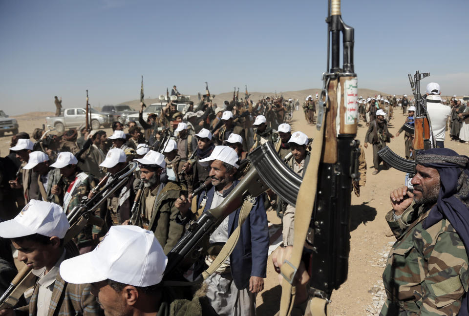 Houthi fighters march during a rally of support for the Palestinians in the Gaza Strip and against the U.S. strikes on Yemen outside Sanaa on Monday, Jan. 22, 2024. (AP Photo)