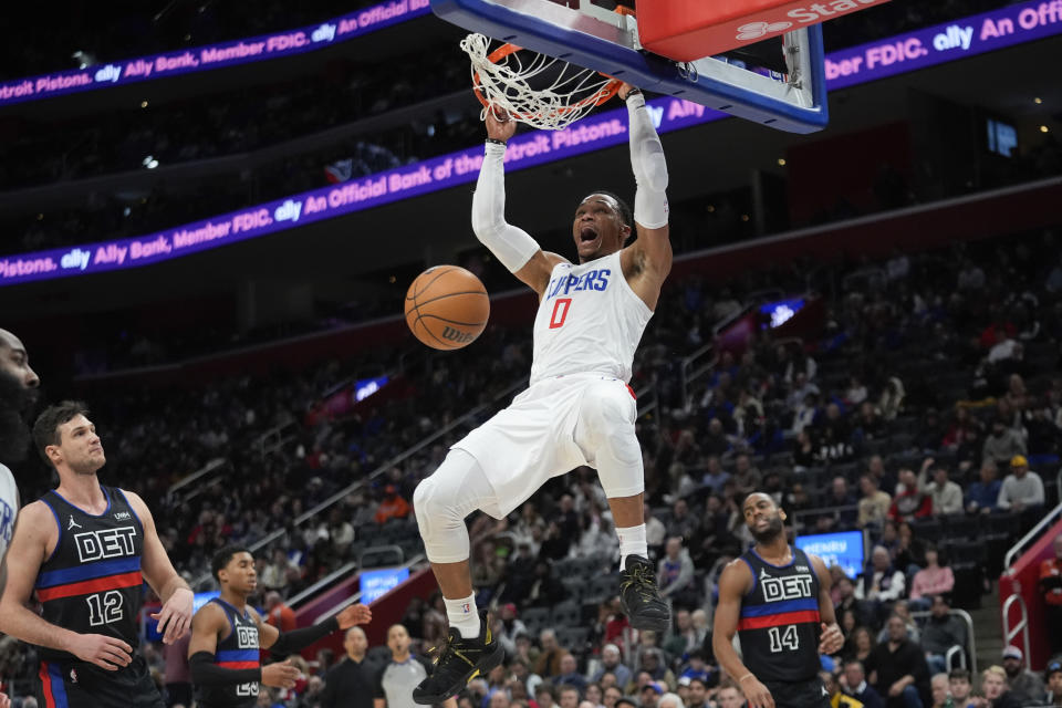 Los Angeles Clippers guard Russell Westbrook (0) dunks against the Detroit Pistons in the second half of an NBA basketball game in Detroit, Friday, Feb. 2, 2024. (AP Photo/Paul Sancya)