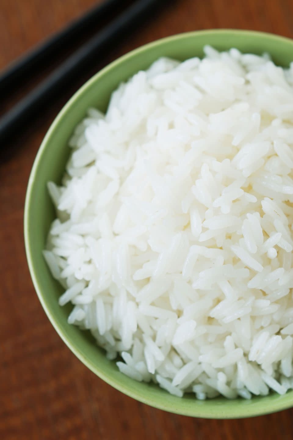 Slash rice calories in half with coconut oil.
