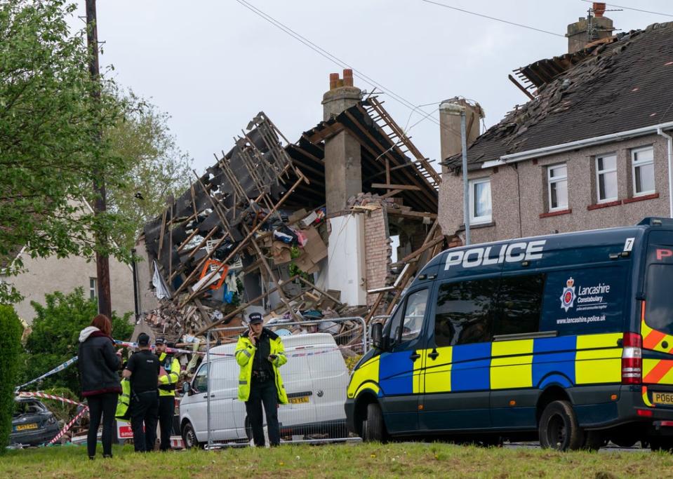 Emergency workers at the scene of the explosion (Danny Lawson/PA) (PA Wire)