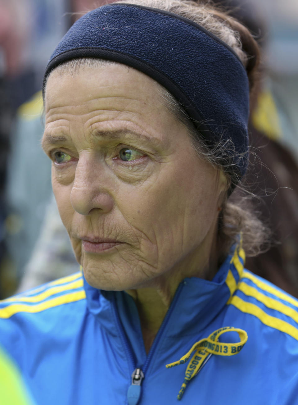 Jennifer Black, 71 of Loveland, Ohio, speaks about her experience during a gathering at a memorial for victims of the 2013 Boston Marathon bombing, Saturday April 15, 2023, in Boston. (AP Photo/Reba Saldanha)