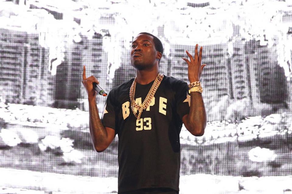 Meek Mill performing on stage (Neilson Barnard/Getty Images)