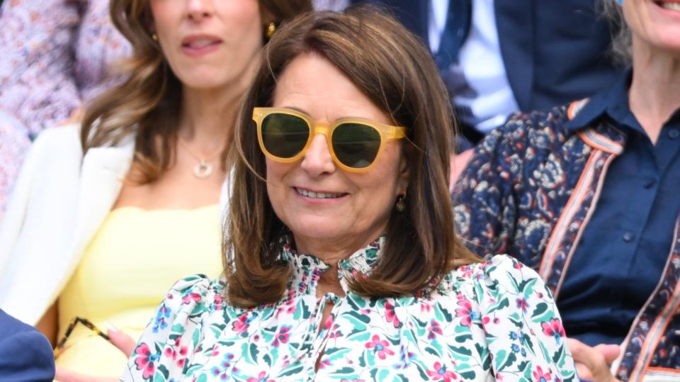 Carole Middleton wearing yellow sunglasses attends day four of the Wimbledon Tennis Championships