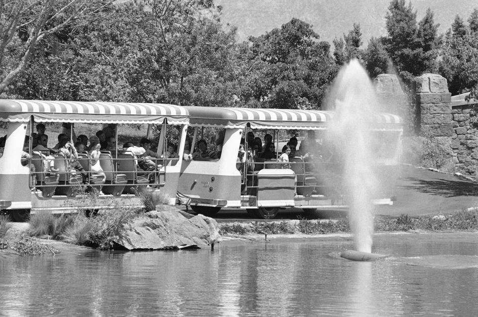 Visitors on the then-Universal Studio Tour flinch as a geyser erupts in a simulated torpedo attack at Universal Studios Hollywood in 1971.