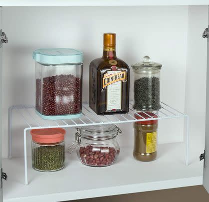 Use these racks to create more space for tins and cans in the cupboards