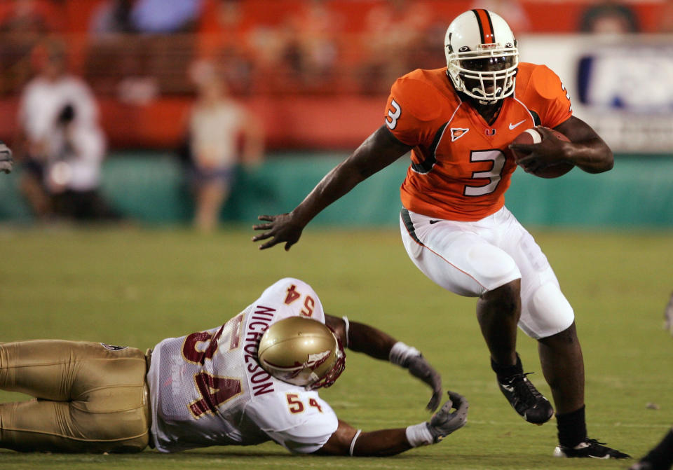 Frank Gore, right, became one of the best runners in Miami Hurricanes history despite two major injuries in college. (Photo by Robert Laberge/Getty Images)