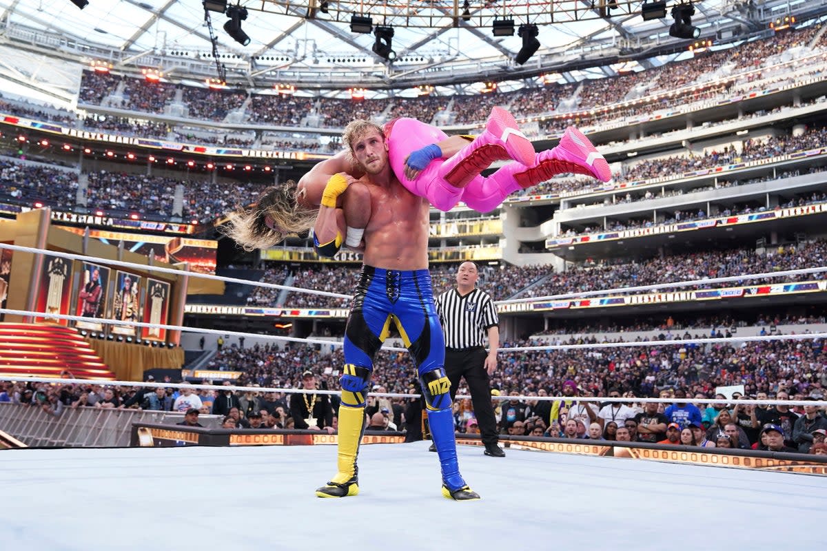 Wrestling may be fake, but Logan Paul is capable of pulling off feats of athleticism that will make you believe a man can fly (WWE via AP)