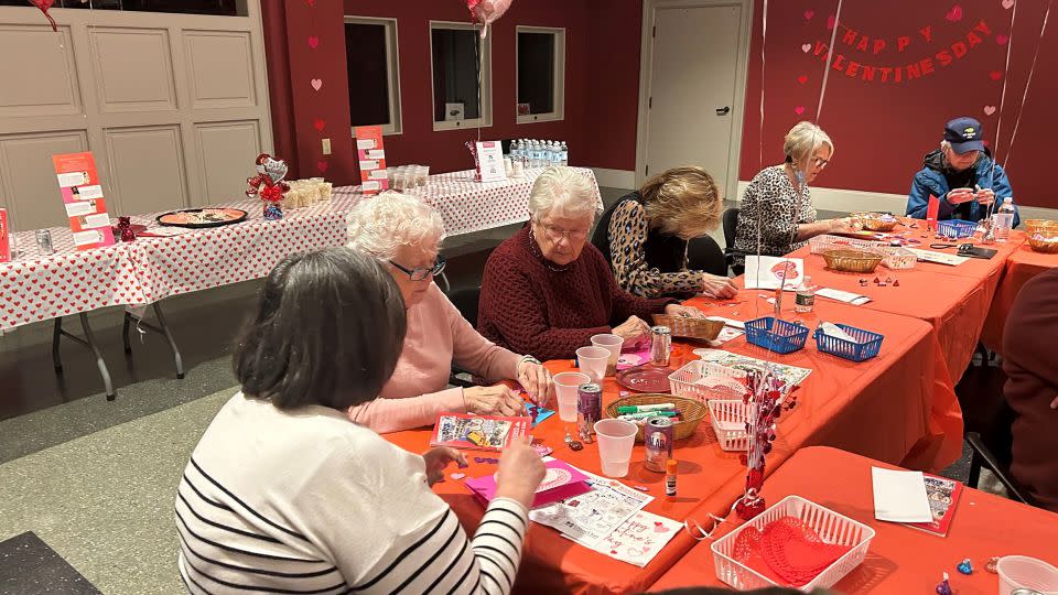 Every year Worcester residents try their hand at making Howland-style valentines as part of contests and events honoring her legacy. This photo shows a group making valentines recently at the Worcester Historical Museum. - Courtesy Collection of Worcester Historical Museum