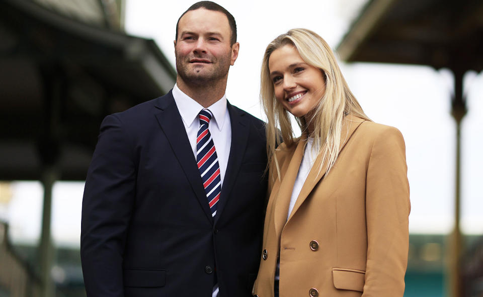 Boyd Cordner, pictured here with partner Jemma Barge at his retirement announcement in 2021.