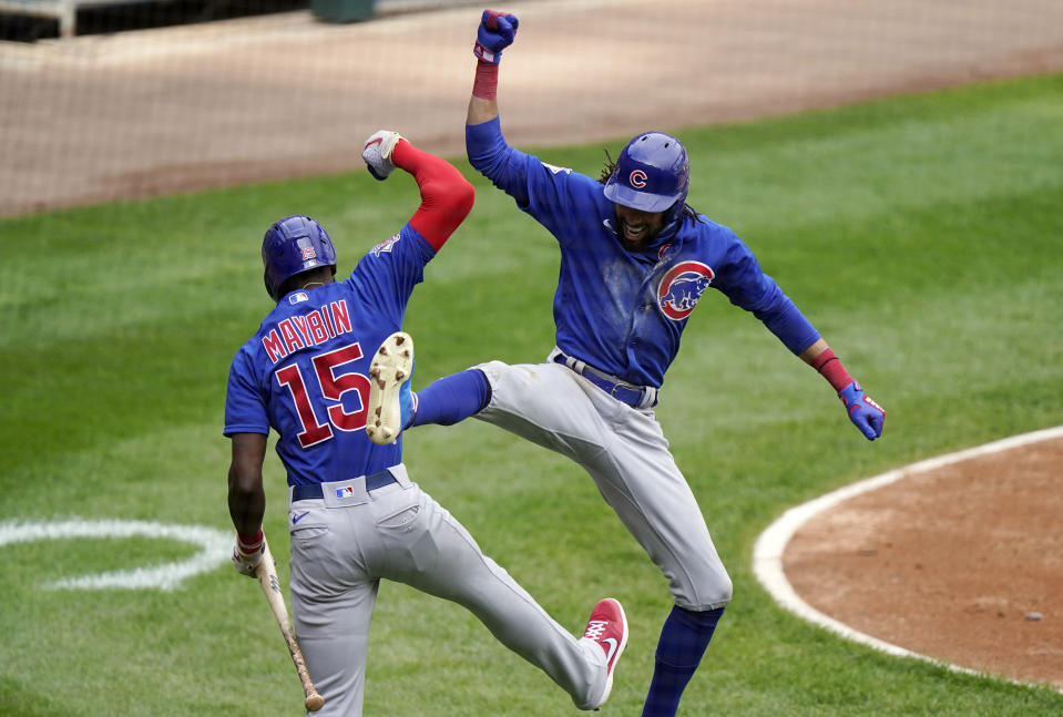 Chicago Cubs' Billy Hamilton, right, celebrates with Cameron Maybin after hitting a solo home run during the fourth inning of a baseball game against the Chicago White Sox in Chicago, Sunday, Sept. 27, 2020. (AP Photo/Nam Y. Huh)