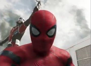 Spider-Man talking to his camera with Giant-Man grabbing War Machine in the background in "Spider-Man: Homecoming"