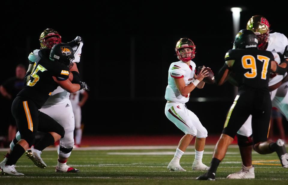 aSeptember 2, 2022; Scottsdale, Arizona; USA; Bergen Catholic quarterback Dominic Campanile (17) looks for receivers against Saguaro during a game at Saguaro High School.