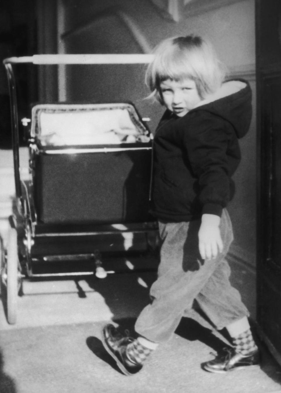 <p>A young Diana Spencer pushes a stroller at Park House, Sandringham in Norfolk. In 1983, the Queen turned Park House into a <a href="https://www.sandringhamestate.co.uk/holiday-cottages-sandringham/park-house-hotel/" rel="nofollow noopener" target="_blank" data-ylk="slk:hotel;elm:context_link;itc:0;sec:content-canvas" class="link ">hotel</a> specifically designed to accommodate disabled people and their families. </p>