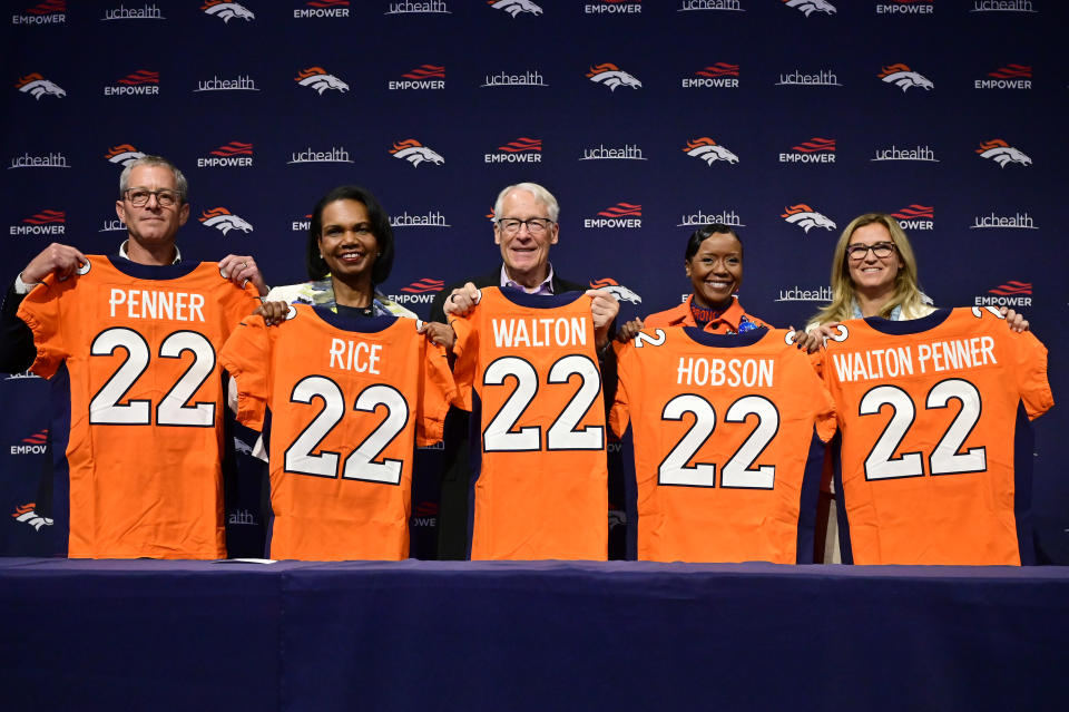 CENTENNIAL, CO - AUGUST 10 : From left, Greg Penner, Condoleezza Rice, Rob Walton, Mellody Hobson and Carrie Walton-Penner photographed at the UCHealth Training Center in Centennial, Colorado on Wednesday, August 10, 2022.The Walton-Penner ownership group, which includes limited partners Mellody Hobson, Condoleezza Rice and Sir Lewis Hamilton, paid $4.65 billion for the Broncos. (Photo by Hyoung Chang/The Denver Post)