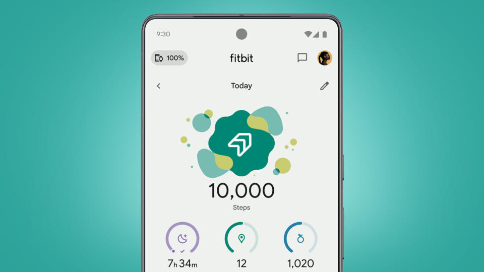 A phone on a green background showing the Fitbit app