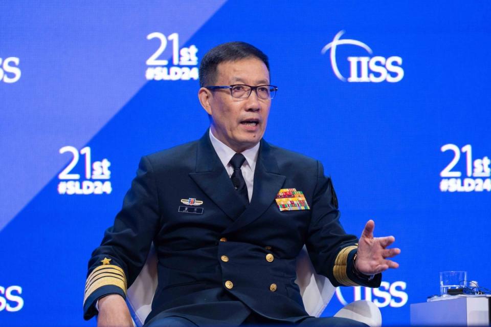 Admiral Dong Jun, China’s minister of defence, at the same conference as Mr Zelensky, denied that Beijing supported Russia’s war effort (EPA)