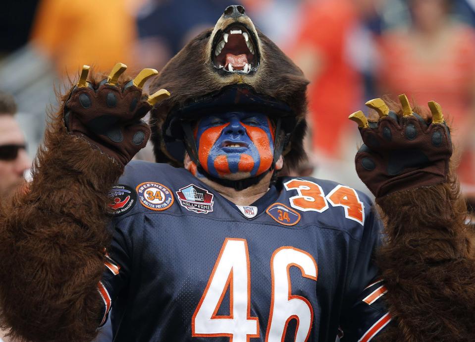 A Chicago Bears fan cheers prior to the start of an NFL football game between the Chicago Bears and the Cincinnati Bengals in Chicago, Illinois