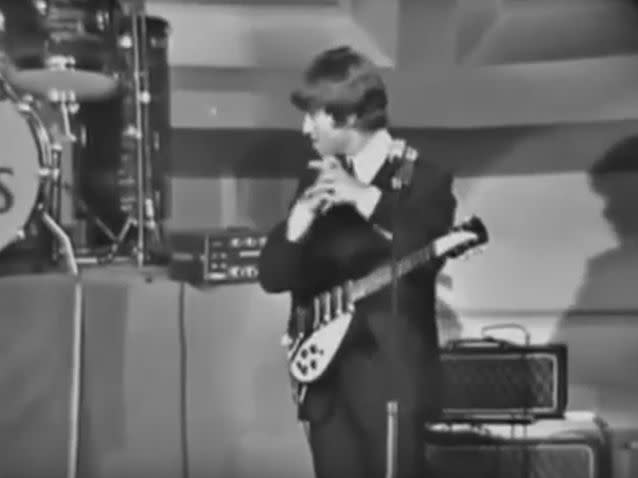 Video of John Lennon launching into awkward hand-clapping and violent foot stomping on stage has shocked viewers after it was aired on UK television. Photo: Youtube