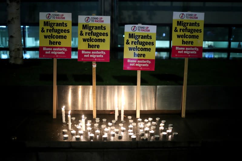 Anti-racism campaigners take part in a vigil, following the discovery of 39 bodies in a truck container, outside the Home Office in London