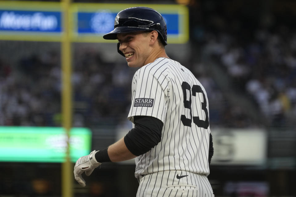 New York Yankees' Ben Rice smiles on first base after hitting a single against the Baltimore Orioles during the third inning of a baseball game Tuesday, June 18, 2024, in New York. (AP Photo/Pamela Smith)