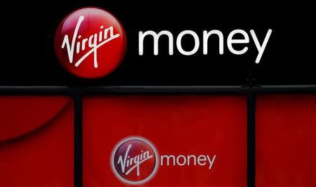 FILE PHOTO: Signage is see outside a branch of Virgin Money. Picture taken September 21, 2017. REUTERS/Phil Noble/File Photo