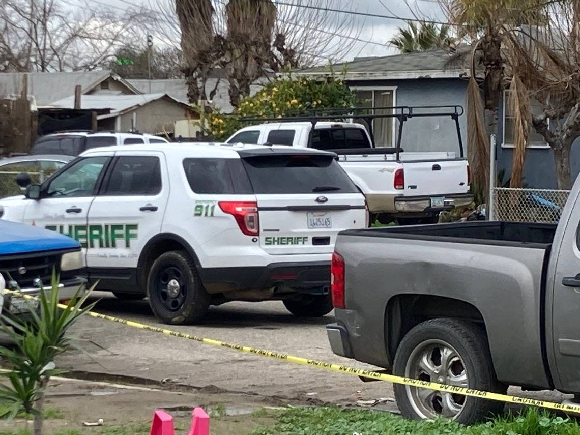 Tulare County Sheriff’s deputies continued to investigate the home Tuesday, Jan. 17, 2023, where six people were killed the previous day in a potential drug cartel massacre. LEWIS GRISWOLD/Special to The Bee