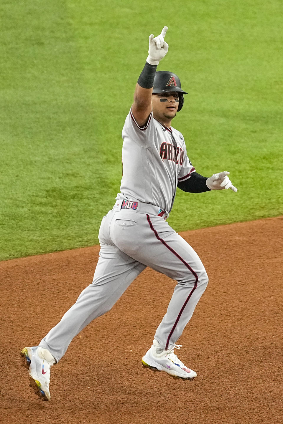 Arizona Diamondbacks' Gabriel Moreno celebrates a home run against the Texas Rangers during the fourth inning in Game 2 of the baseball World Series Saturday, Oct. 28, 2023, in Arlington, Texas. (AP Photo/Tony Gutierrez)