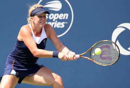 Aug 9, 2018; Montreal, Quebec, Canada; Anastasia Pavlyuchenkova of Russia hits a shot against Simona Halep of Romania (not pictured) during the Rogers Cup tennis tournament at Stade IGA. Mandatory Credit: Jean-Yves Ahern-USA TODAY Sports