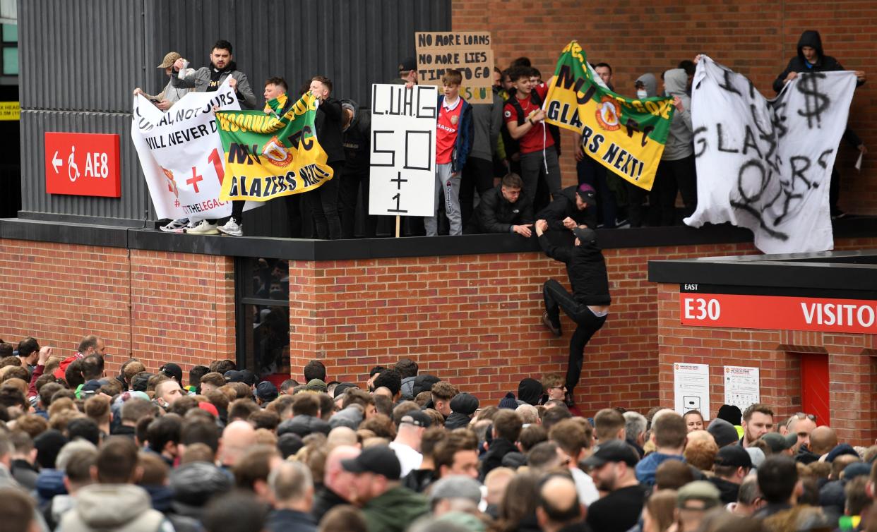 Supporters protest against Manchester United's owners.