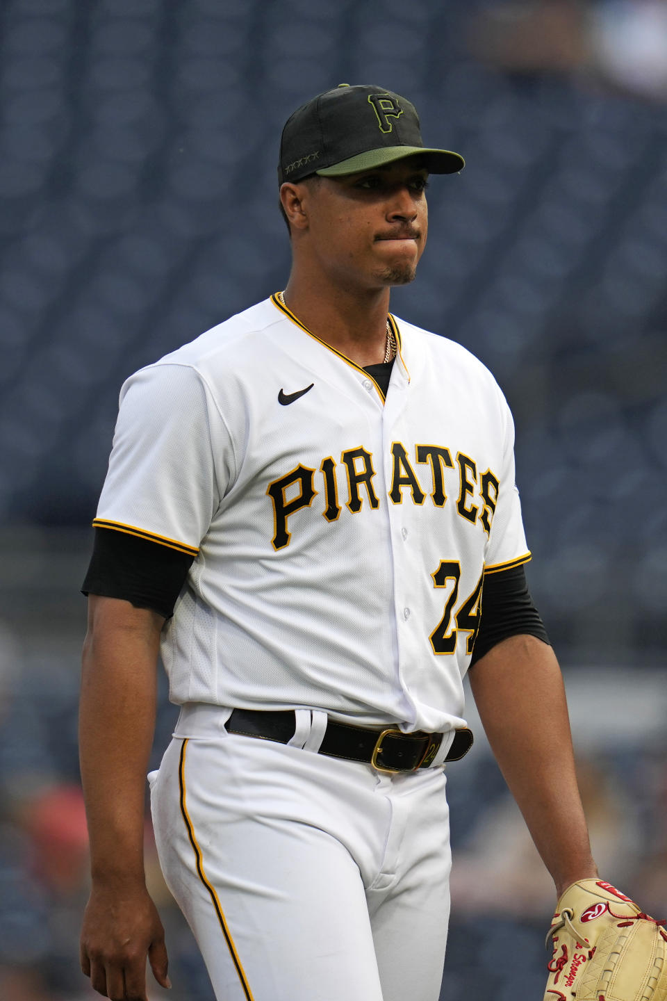 Pittsburgh Pirates starter Johan Oviedo walks to the dugout after pitching the top of the first inning of a baseball game against the Oakland Athletics in Pittsburgh, Monday, June 5, 2023. (AP Photo/Gene J. Puskar)