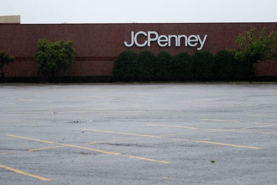 A parking lot sits empty outside a JCPenny in Texas. 