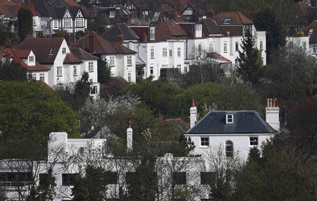 Houses are seen on Highgate Hill in north London April 3, 2014. London house prices have increased by 20 per cent in the last year, local media reported. REUTERS/Suzanne Plunkett