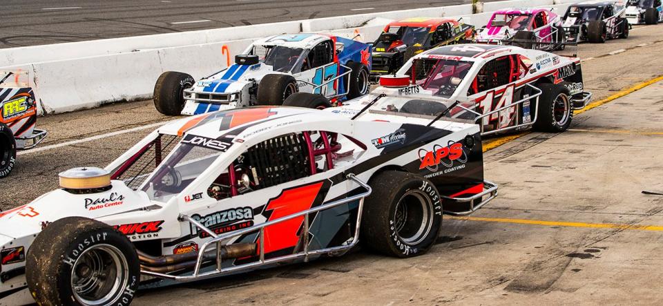 Cars line up on the grid for practice before the John Blewett III Memorial as part of the World Series of Asphalt Stock Car Racing event at New Smyrna Speedway in New Smyrna, Florida on February 10, 2021. (Adam Glanzman/NASCAR)