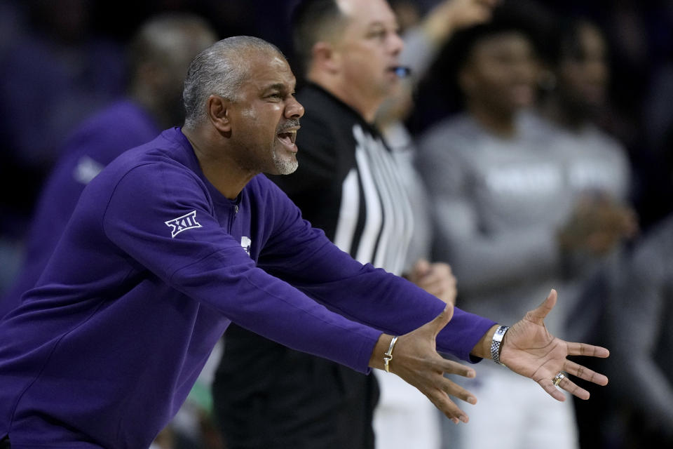 Kansas State head coach Jerome Tang talks to his players during the first half of an NCAA college basketball game against South Dakota State Monday, Nov. 13, 2023, in Manhattan, Kan. (AP Photo/Charlie Riedel)