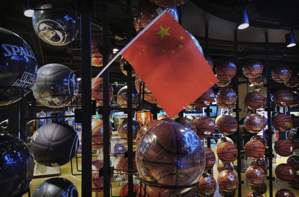 China's flag hangs in the NBA store amid basketballs.
